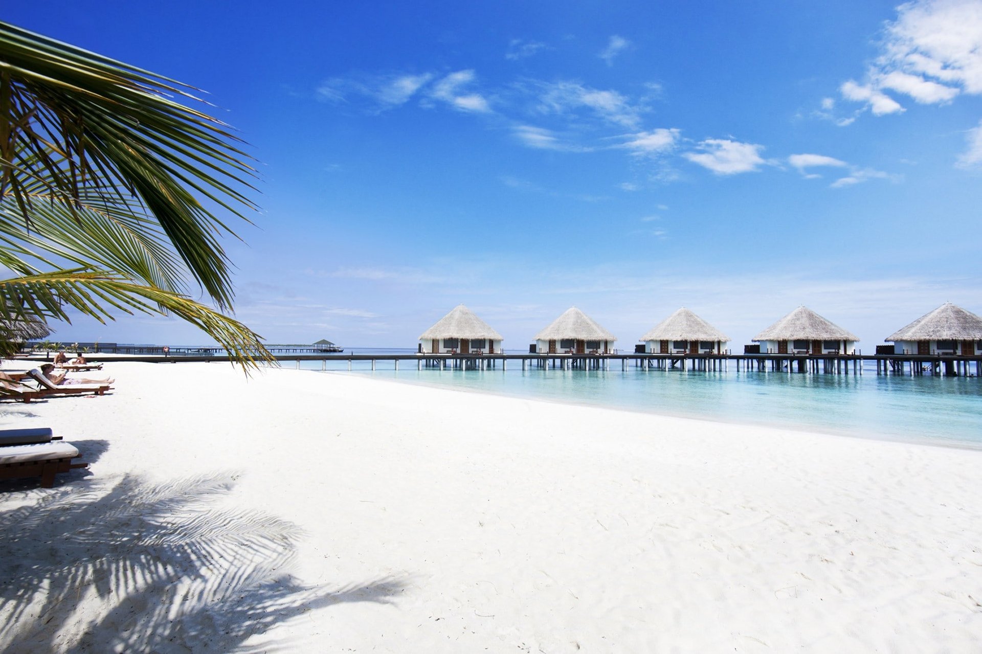 Overwater villas on a turquoise lagoon at Adaaran Prestige Vadoo, South Malé Atoll, Maldives